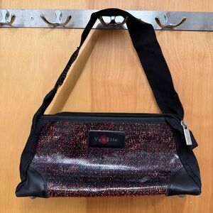 Vy & Elle recycled billboard small purse
